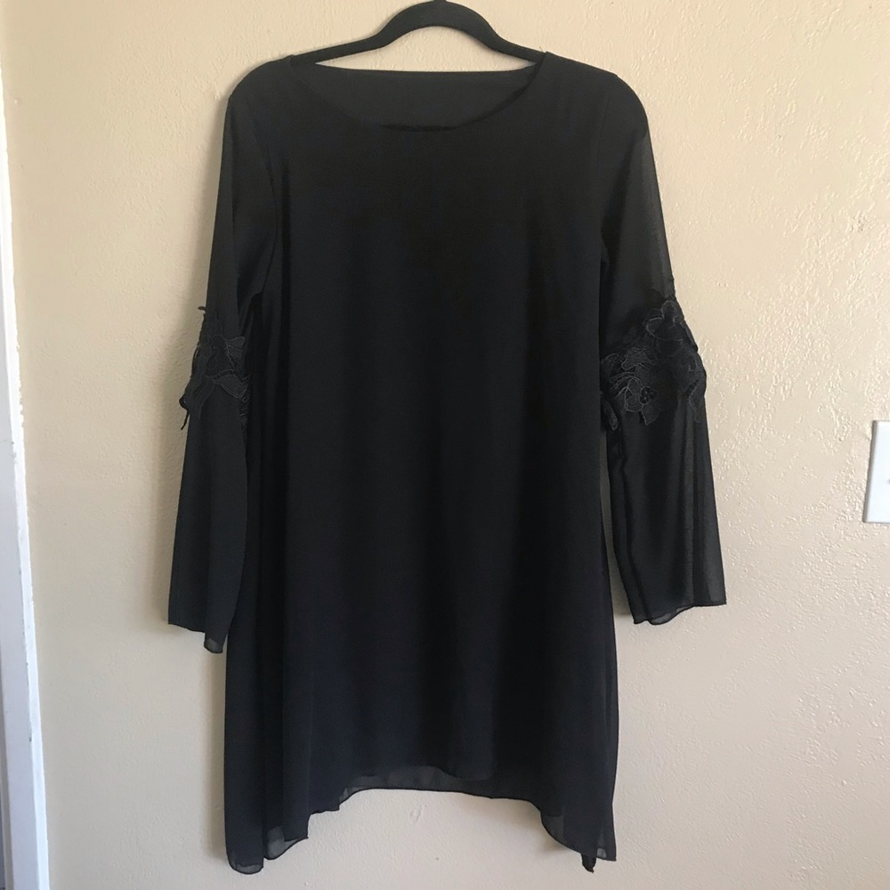 Black shift dress with embroidery on sleeves